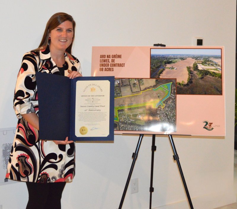 SCLT Executive Director Sara Bluhm displays a proclamation from Gov. Matt Meyer recognizing the organization’s 25th anniversary. SUBMITTED PHOTOS